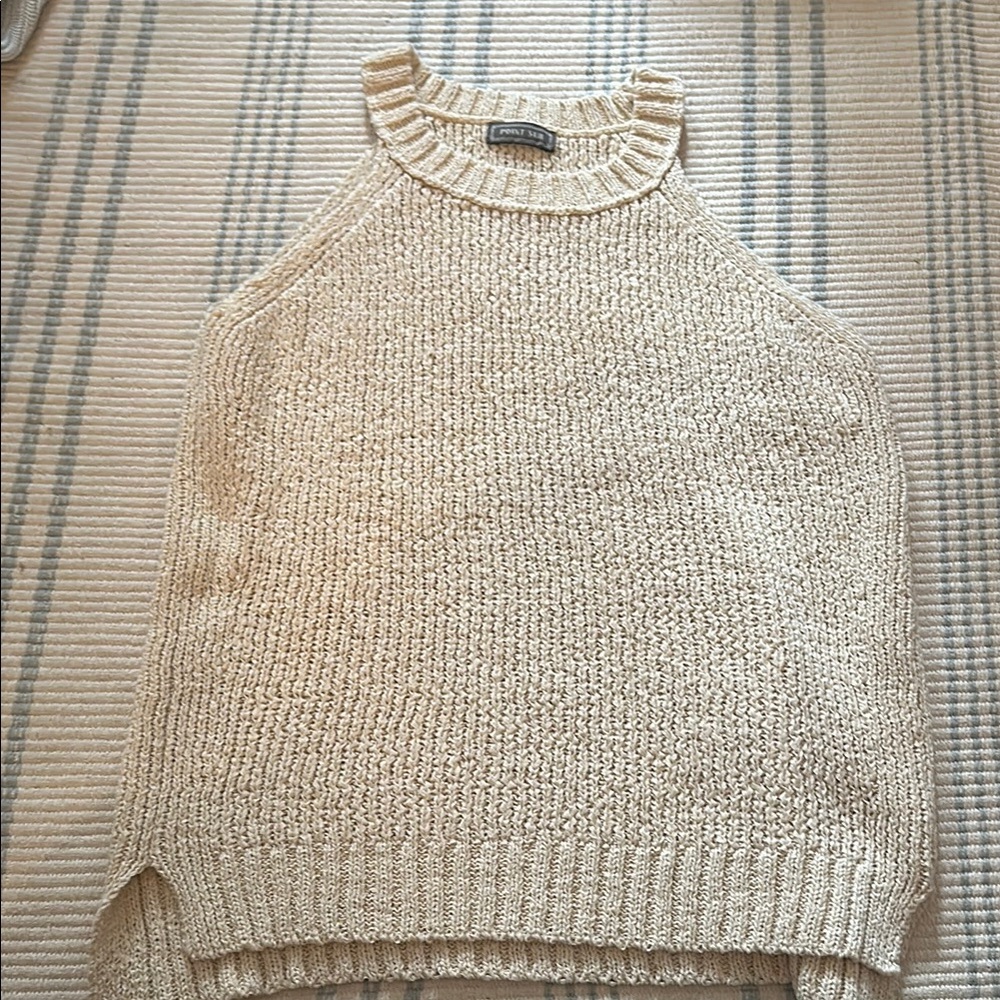 Cream Sleeveless Tank Top with Ruffled Neckline and Chunky Knit Pattern